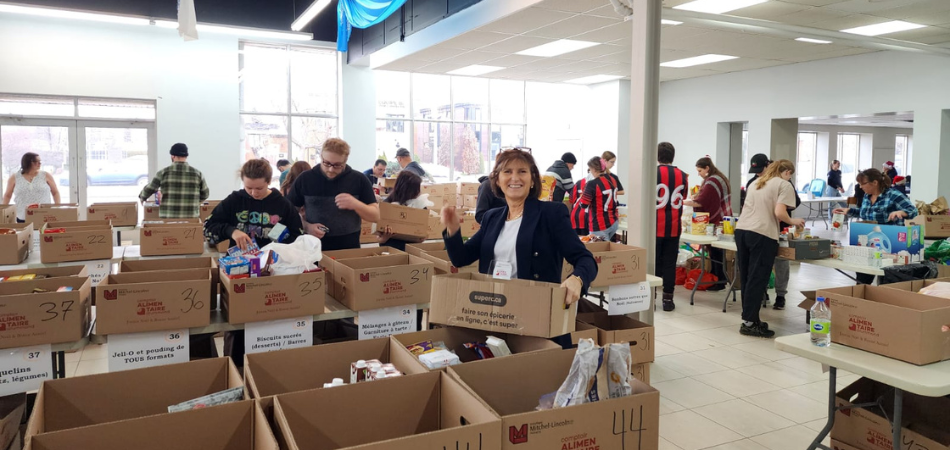 Members of the Drummondville team participate in La Guignolée, the community's annual holiday food drive.